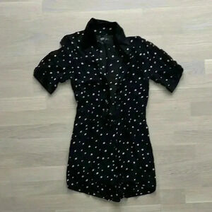 Reformation black romper with white stars size XS